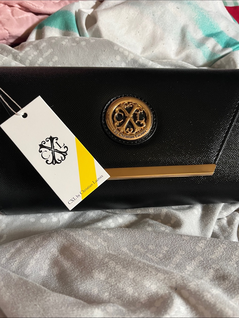 Christian Lacroix Black Clutch with Gold Emblem and Bar